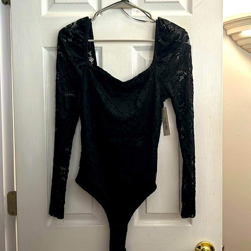 Streetwear Society Black long sleeve lace body suit from Charlotte Russe